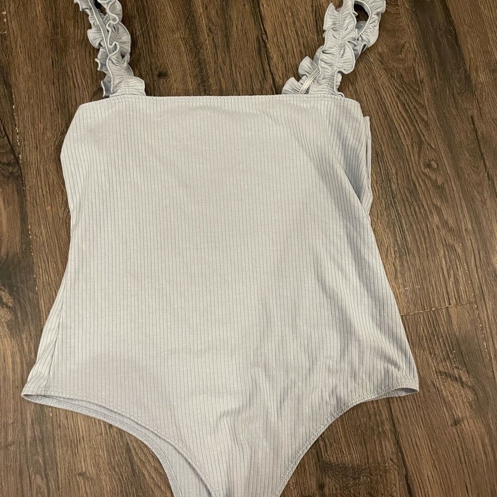 boutique body suit with detail
